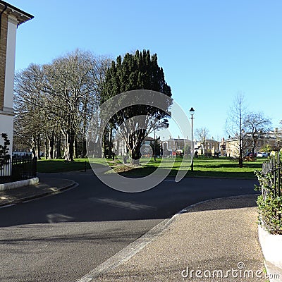 Green public space in a neighborhood in Poundbury Stock Photo