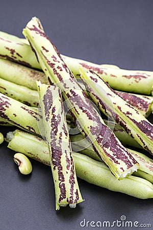 Green-purple Yard Long Bean on black ready for cooking Stock Photo