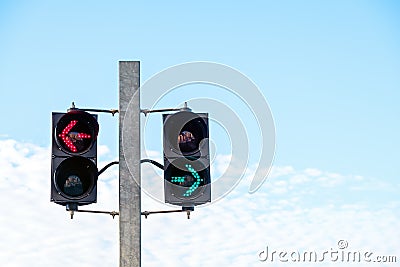Green and red arrow safety light signals Stock Photo