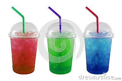 Green, Red and Blue soda and ice in plastic grass isolated Stock Photo