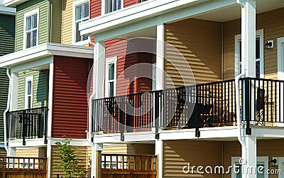 Green Red Yellow Row Houses Balconies Stock Photo