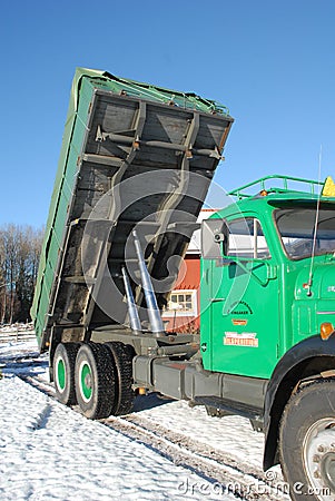 Retro Volvo truck from 1972 on snowy roads Editorial Stock Photo