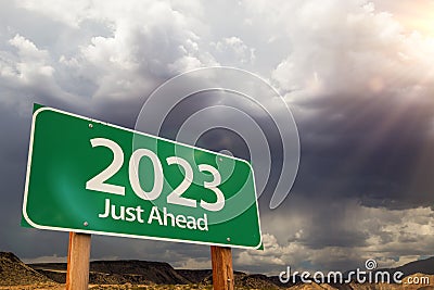 2023 Green Road Sign Over Dramatic Clouds and Sky Stock Photo