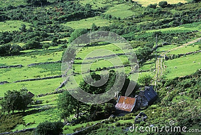 Green rolling fields in Healy Pass, Cork, Ireland Stock Photo