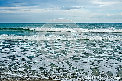Green Rolling Waves and White Frisky Waves Stock Photo