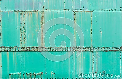 Green Rusty metal painted background, grunge texture,train surface. Stock Photo