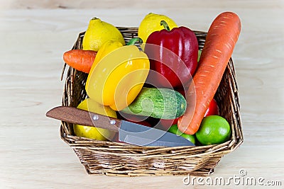 A green salad in wood cup consisting of a mixture of small usually Green leafy vegetable Stock Photo