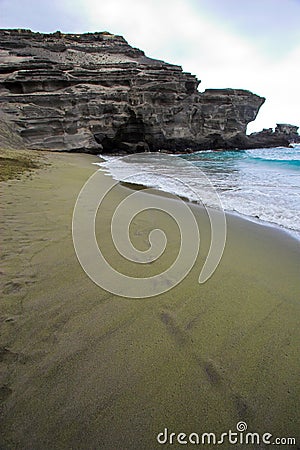 Green sand beach Stock Photo