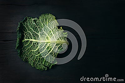 Green savoy cabbage on wood table Stock Photo