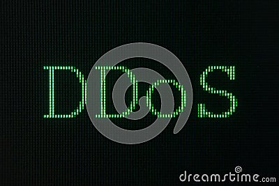Green sign of DDoS, Distributed Denial of Service, displayed on computer screen Stock Photo