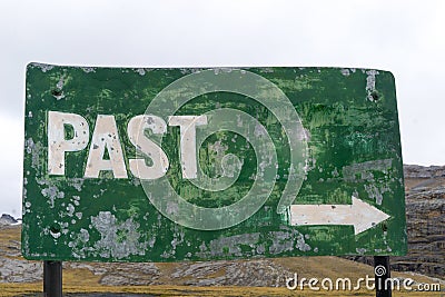 Green sign with the word past and arrow Stock Photo