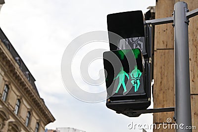 Green signal light for pedestrian and bicycle rider Stock Photo