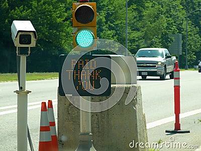 Green Signal Light at Toll Booth Stock Photo