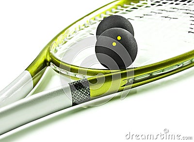 Green and silver squash racket and balls Stock Photo