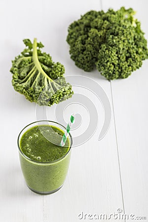 Green smoothie with kale leaves Stock Photo