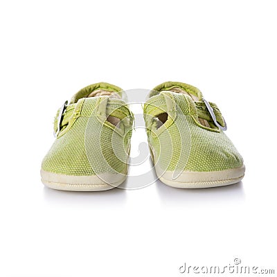 Green sneakers shoes for kids isolated on white background Stock Photo