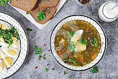 Green sorrel soup with eggs. Summer menu. Healthy food. Stock Photo