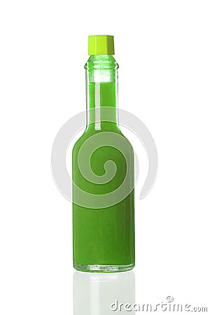 Green spicy sauce in a little bottle Stock Photo