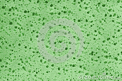 Green spongy texture of a rubber sponge or insulation foam Stock Photo