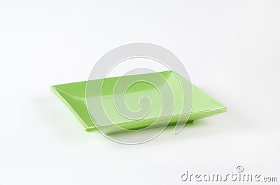 Green square plate Stock Photo