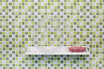 Green Square Tile Wall with Shelve and Soap Dish Stock Photo