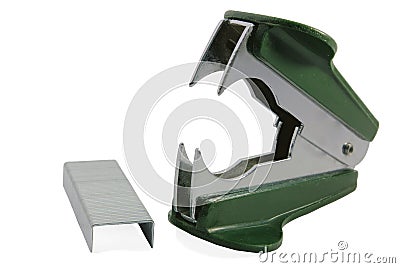 Green staple remover and staples Stock Photo