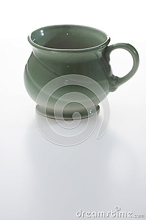 Green stoneware mug Stock Photo