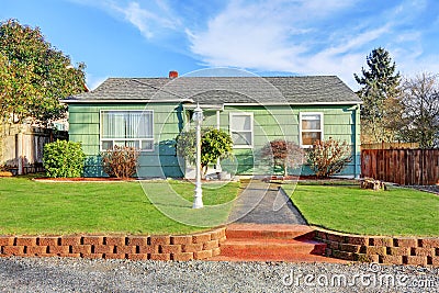 Green Suburban Bungalow style home Stock Photo