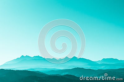 Green surreal mountains against the backdrop of a turquoise sky, fantastic fairytale mountain landscape Stock Photo