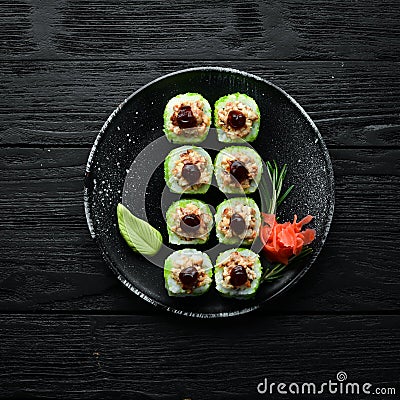 Green Sushi rolls - with eel fish and green Stock Photo