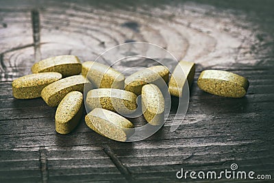 Green tablets. dietary supplements Stock Photo