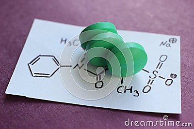 Green tablets of Metamizole sodium or Analgin. Stock Photo