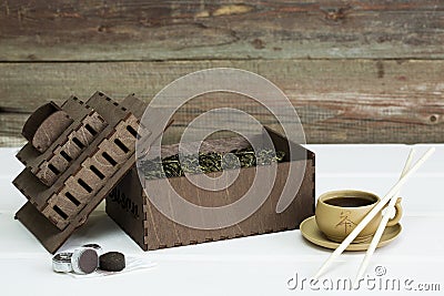 Green tea leaves in a gift box Stock Photo