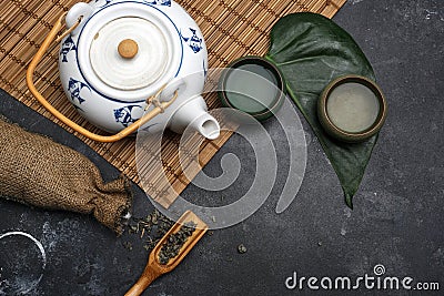 Green tea in a teapot in Chinese or Japan style. Tea concept Stock Photo