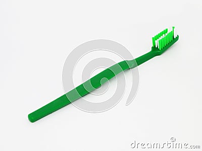 Green tooth brush on a white Stock Photo