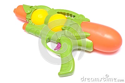 Green toy water gun against a white backdrop Stock Photo