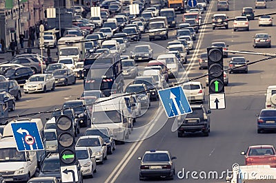 Green traffic lamps and blue sign Stock Photo