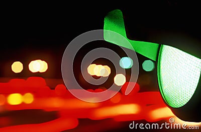 Green Traffic Light at Night Stock Photo