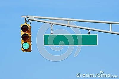 Green traffic signal light with sign Stock Photo