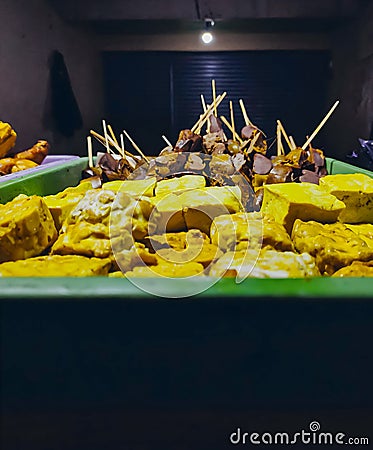 The green tray contains food Fast food Stock Photo