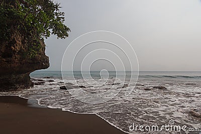 Green tropical mountains and ocean waves Stock Photo