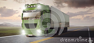 Green truck with a trailer driving on a remote highway through a landscape at dusk Stock Photo