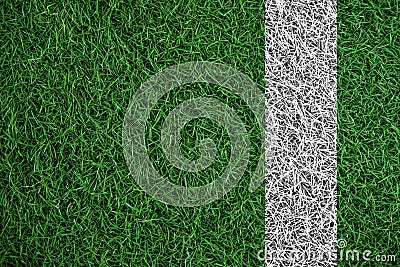 Green turf grass texture with white line, in soccer field Stock Photo