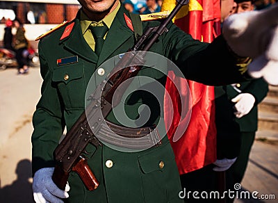 Green uniform of military with long rifle weapon marching Editorial Stock Photo