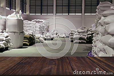 Green unroasted coffee bean sack in food factory Stock Photo