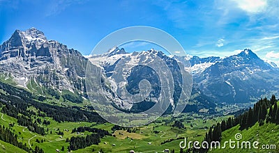 Green valley in the Swiss Alps Stock Photo