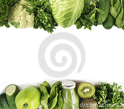 Green vegetables. Green fruit and vegetable on white background. Apples, parsley, spinach, cucumber and kiwi on a white background Stock Photo