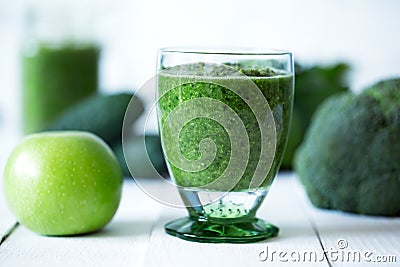 Green vegetables smoothies prepared with cauliflower on the wooden table Stock Photo