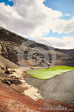 Green volcanic lake Charco de los Clicos at Lanzarote Stock Photo