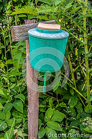 Green washbasin in the yard Stock Photo